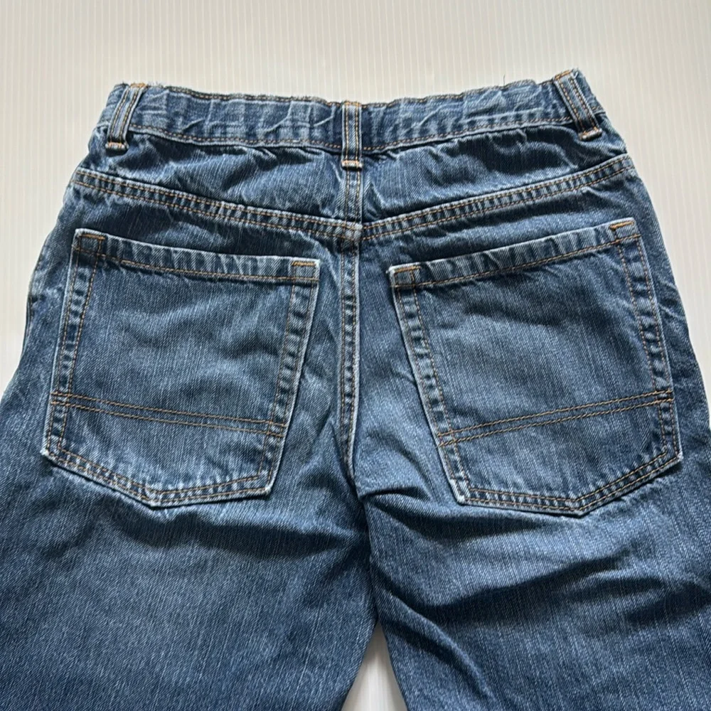 Old Navy straight leg blue jeans.  Boys size 16